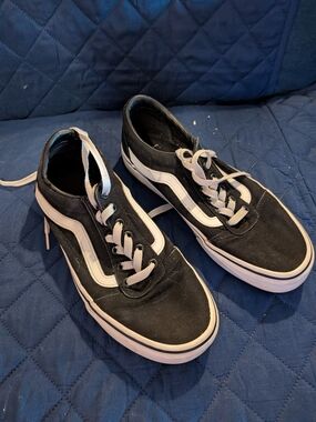 Black Vans Sneakers with White Stripe